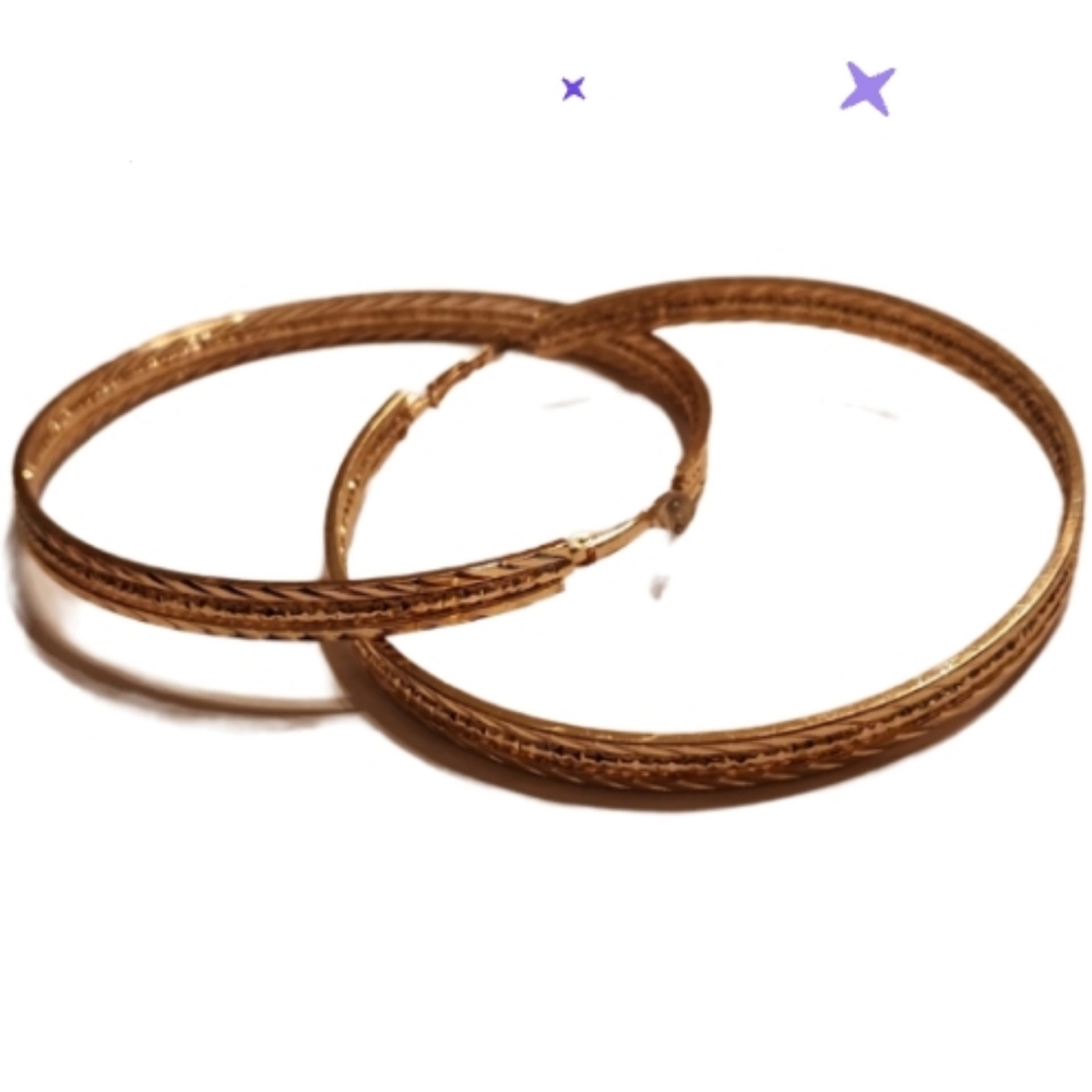Huge goldtoned diamond cut hoops